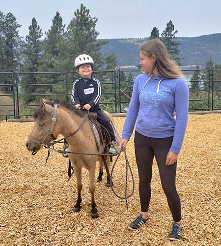 Okanagan Stable's miniature horses are great for toddlers and young children.