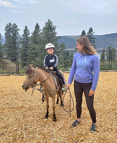 Okanagan Stable's miniature horses are great for toddlers and young children
